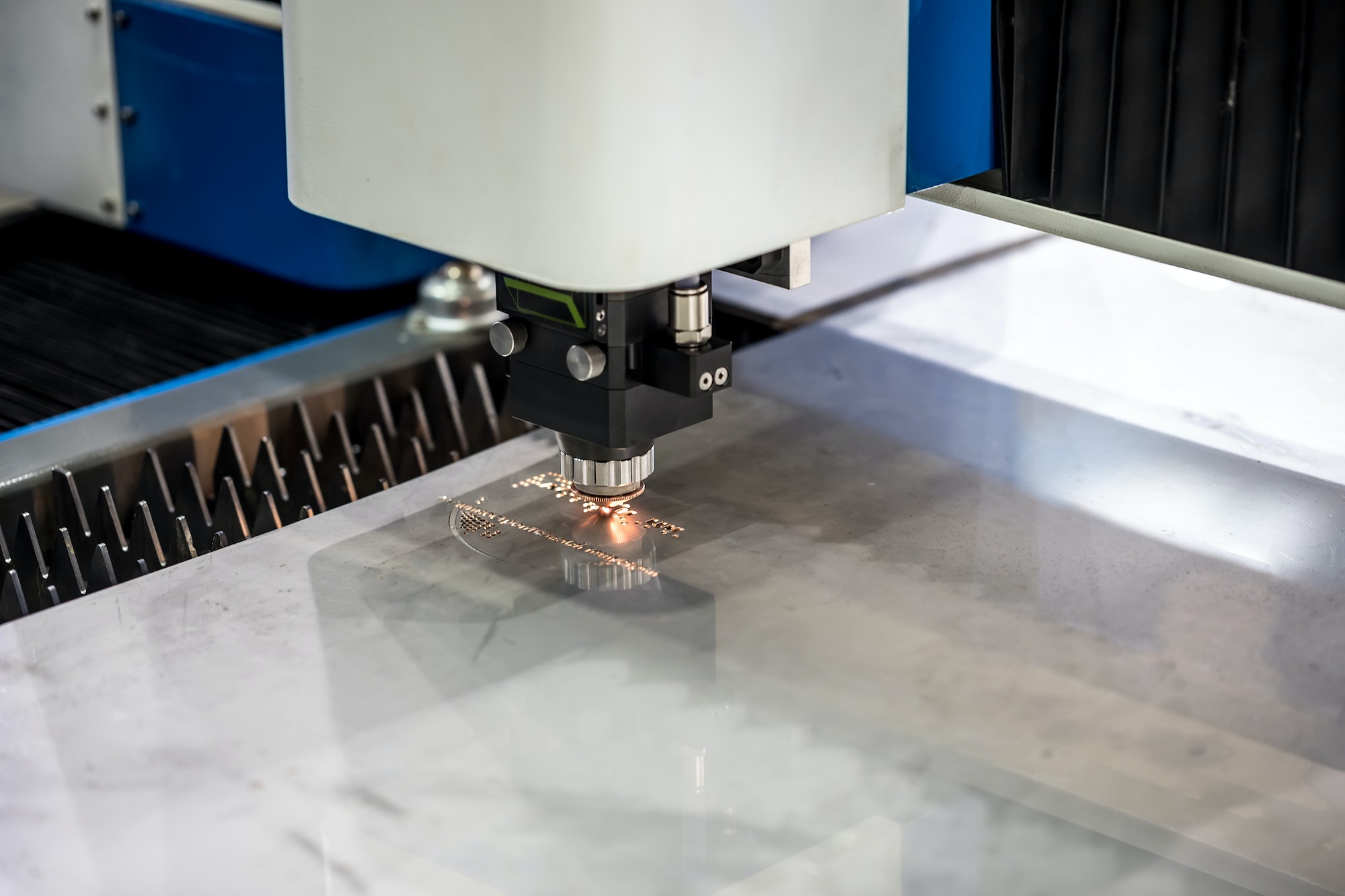 CNC Laser cutting of metal, modern industrial technology.